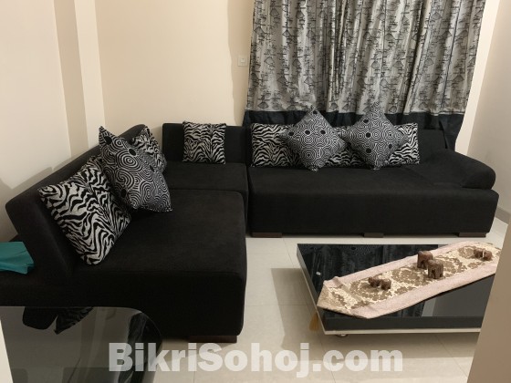 Branded sofa with cushions